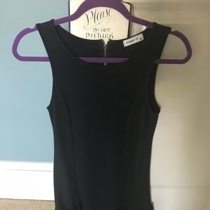 Adorable black dress, with ruffle at the bottom